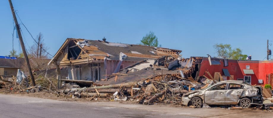 Severely Damaged Buildings and Car after Tornado Touched Down on March 22, 2022 in Arabi, LA, USA